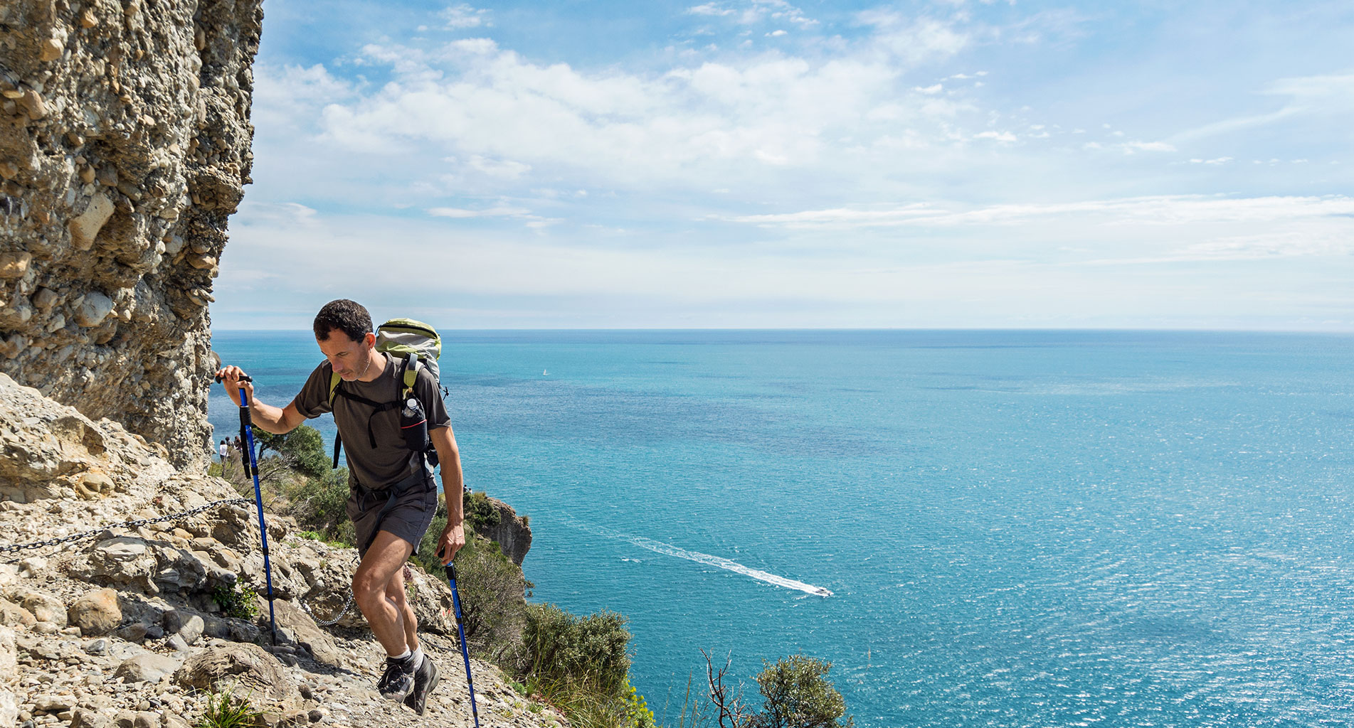 Person trekking on a scenic trail