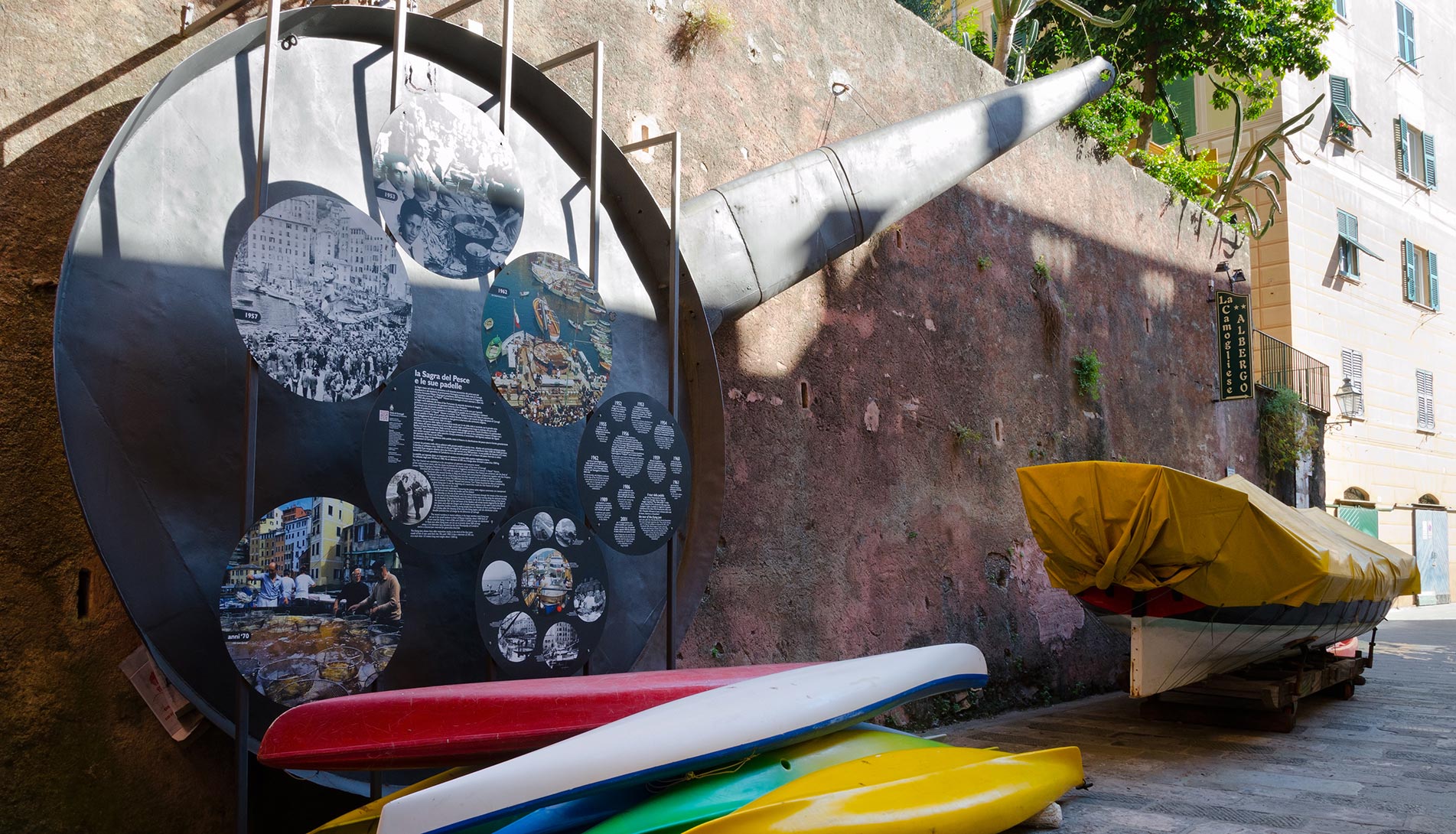 Pan of the fish festival on the wall of Camogli